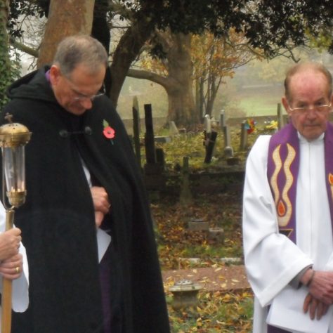 Friday11November-13 Remembrance gathering. Members of the clergy in reflection.