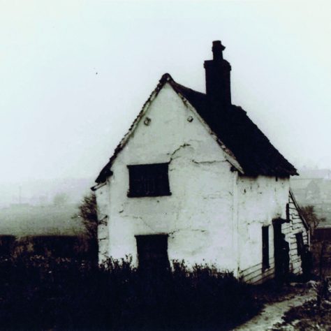 William_White_Cottage_Station_Road_Crayford_3 William White's Cottage, Station Road, Crayford. A white, run-down building stands by itself.