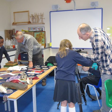 swaisland-project-schools1 Block printing 1. School children are assisted by men.